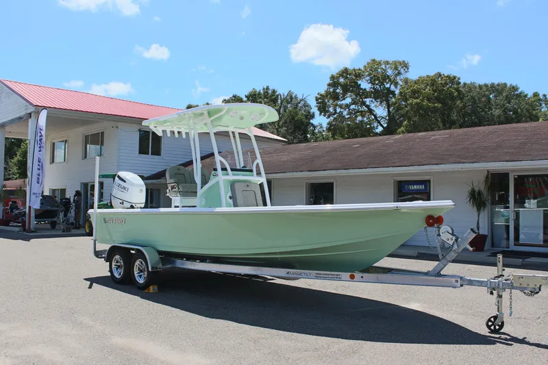 Slide: The Image of 2025 Sea Pro 230 Bay boat on trailer outside dealership. - 3