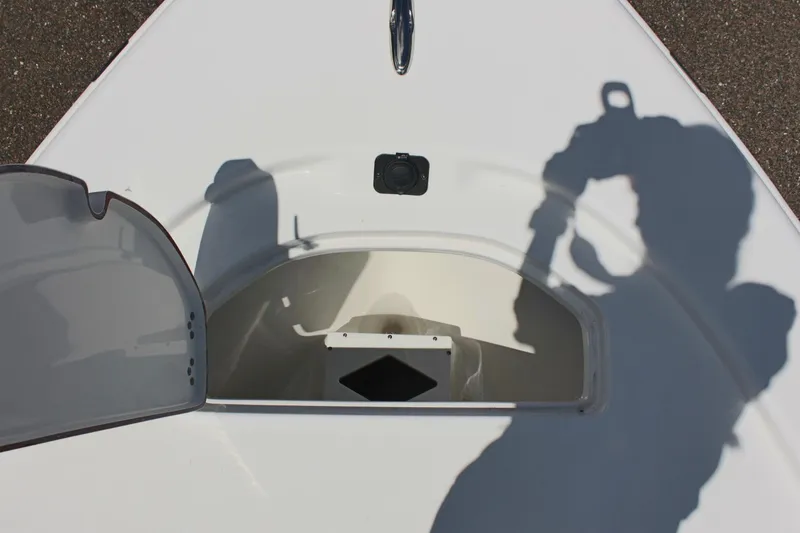 Slide: The Image of Open storage compartment on 2025 Sea Pro 230 Bay boat deck. - 38