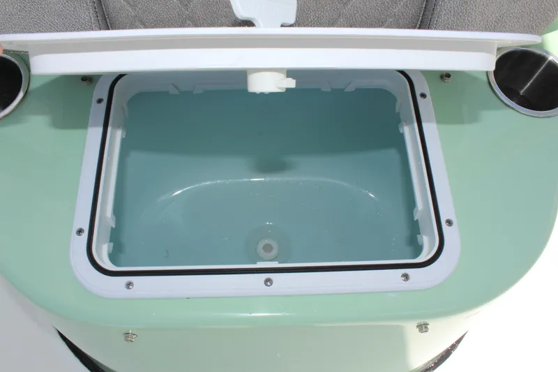 Slide: The Image of 2025 Sea Pro 230 Bay livewell with open lid, showcasing interior design. - 41
