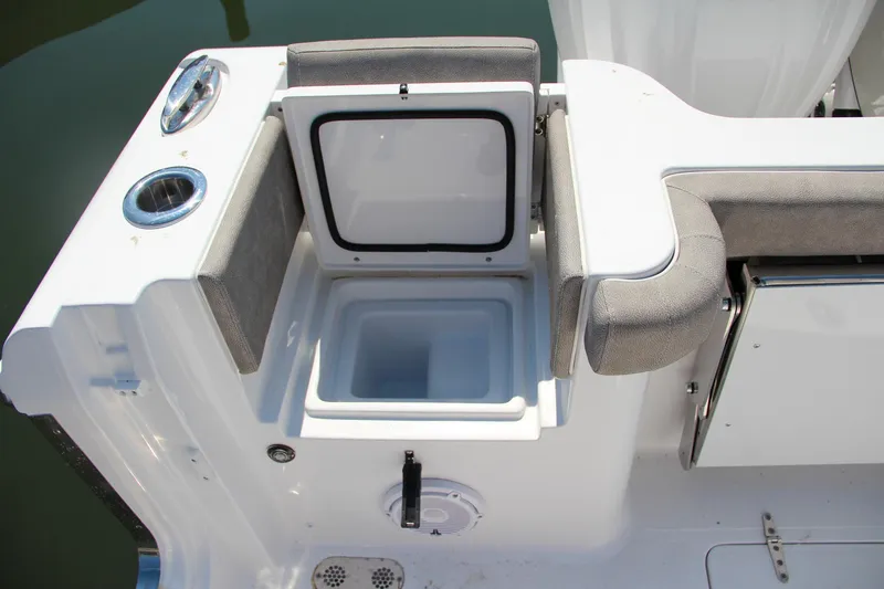 Slide: The Image of Sea Hunt Gamefish 28 boat, 2025 model, featuring an open storage compartment. - 14