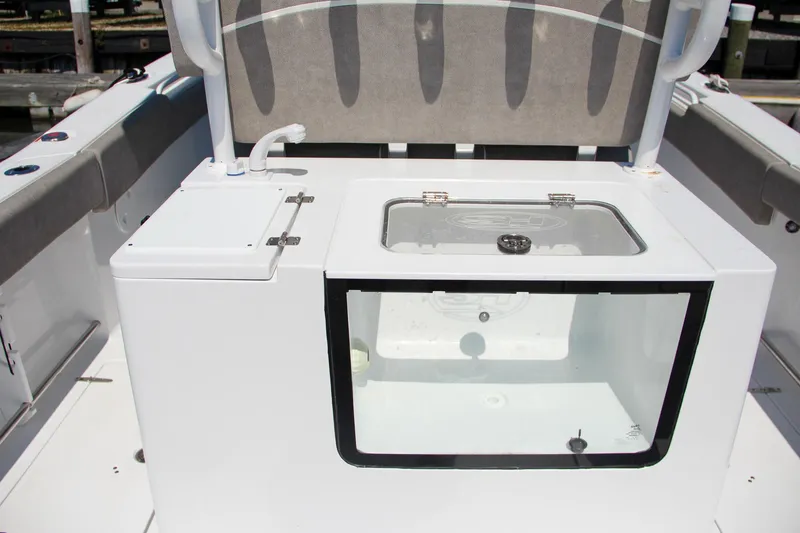Slide: The Image of 2025 Sea Hunt Gamefish 28 boat interior with livewell and seating. - 17