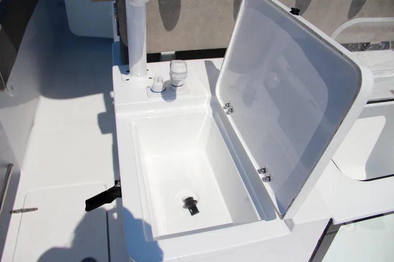 Slide: The Image of Open storage compartment on 2025 Sea Hunt Gamefish 28 boat. - 19