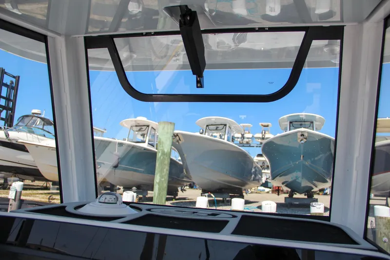 Slide: The Image of View from Sea Hunt Gamefish 28, showcasing docked boats, 2025 model. - 45