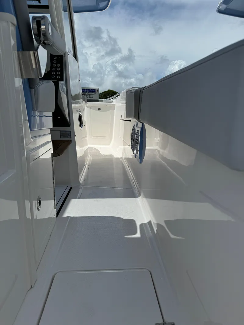 Slide: The Image of 2025 Robalo R360 Center Console boat interior with sleek design and modern features. - 13