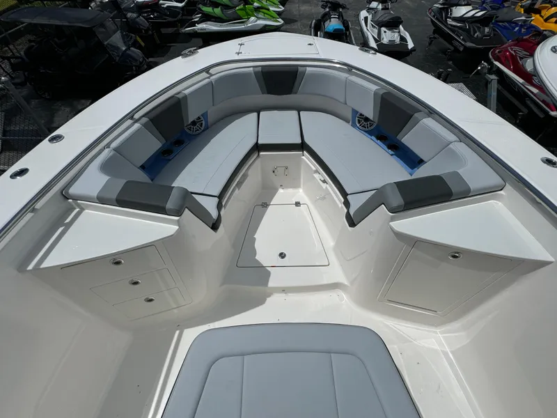 Slide: The Image of 2025 Robalo R360 Center Console boat interior with spacious seating and modern design. - 37