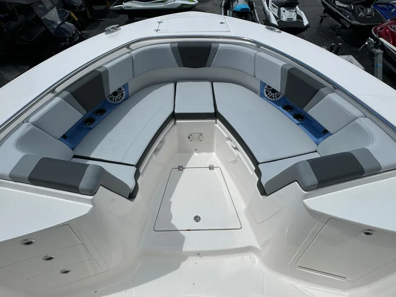 Slide: The Image of 2025 Robalo R360 Center Console boat with spacious seating area and modern design. - 40