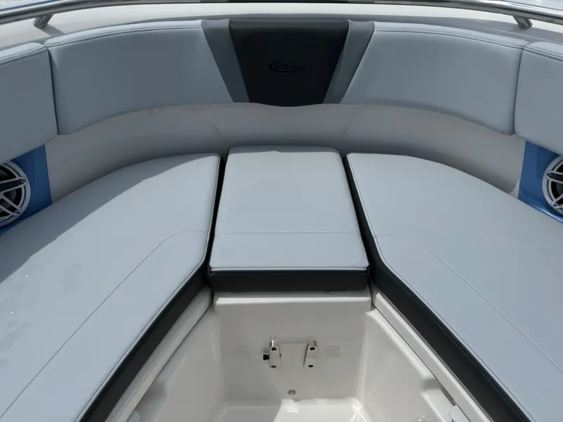Slide: The Image of 2025 Robalo R360 Center Console boat interior with cushioned seating and sleek design. - 43