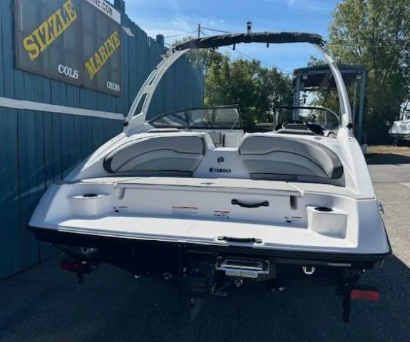 Slide: The Image of 2025 Yamaha Boats AR190, white, rear view, displayed at Sizzle Marine, outdoor setting. - 3
