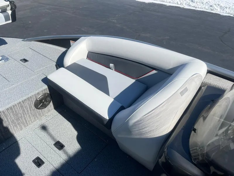 Slide: The Image of 2025 Lowe Deck SD224 boat with sleek seating on a sunny day. - 10
