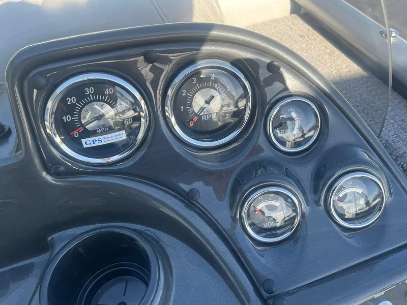 Slide: The Image of Dashboard of 2025 Lowe Deck SD224 boat with gauges and controls. - 19