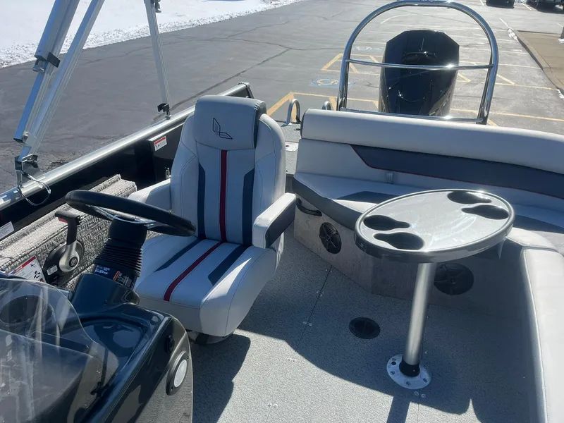 Slide: The Image of 2025 Lowe Deck SD224 boat interior with seating and table, featuring modern design elements. - 5