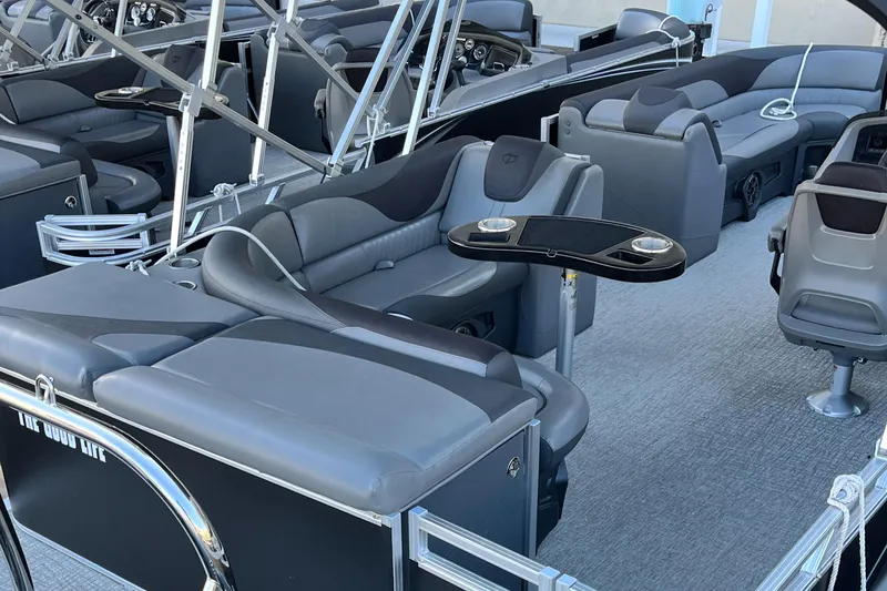 Slide: The Image of 2023 Tahoe Pontoon LTZ Cruise with sleek seating and modern design. - 12