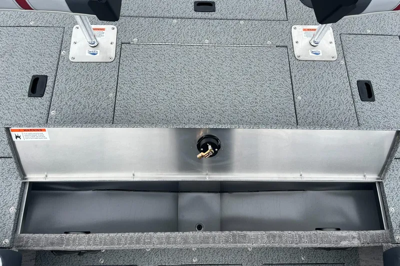 Slide: The Image of 2025 Lowe Deck SD224 boat storage compartment with open lid, showcasing spacious interior. - 12