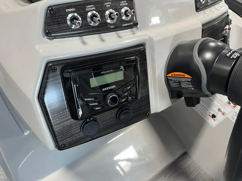 Slide: The Image of Control panel of 2025 Lowe SS 230 WV boat with stereo and navigation system. - 12
