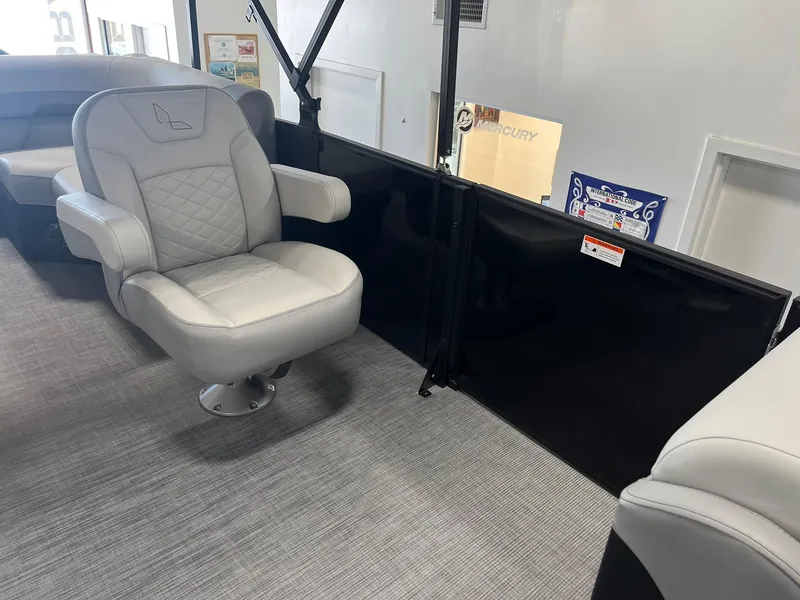 Slide: The Image of 2025 Lowe SS 230 WV boat interior with gray seating and modern design. - 16