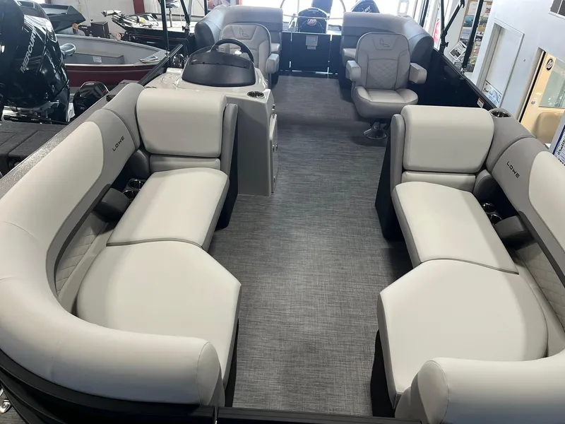 Slide: The Image of 2025 Lowe SS 230 WV boat interior with spacious seating and modern design. - 7