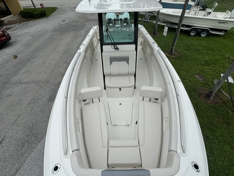 Slide: The Image of 2025 Sailfish 272 CC boat with spacious seating and sleek design. - 25