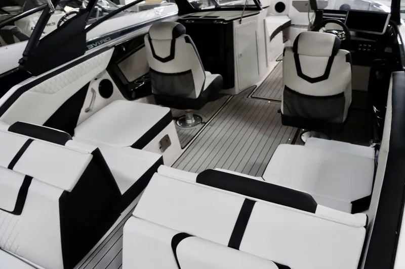 Slide: The Image of 2025 Yamaha Boats 222SD interior with sleek seating and modern design. - 10
