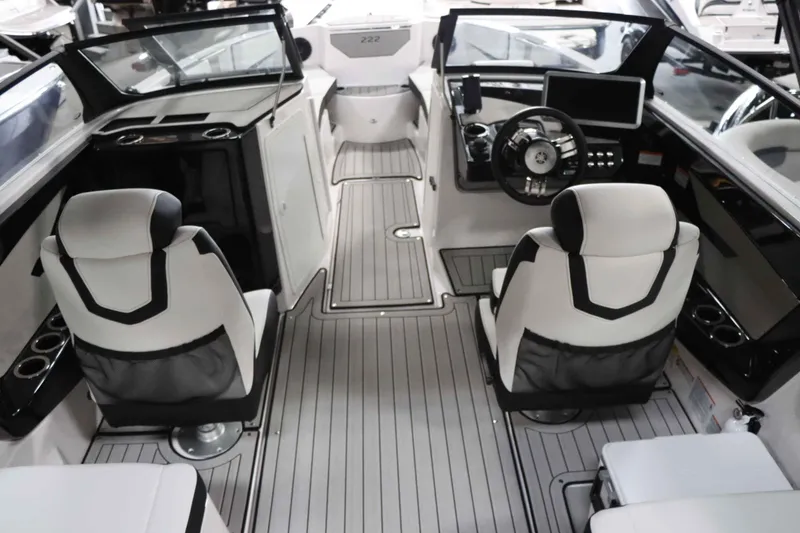 Slide: The Image of 2025 Yamaha Boats 222SD interior with modern helm and seating. - 11