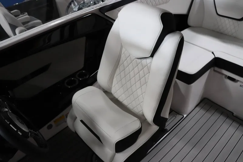 Slide: The Image of 2025 Yamaha Boats 222SD interior with luxurious white seating and modern design. - 16