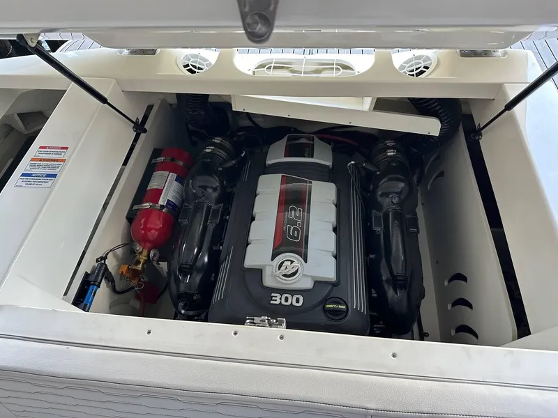 Slide: The Image of 2022 Sea Ray 230SPX boat engine compartment with 6.2L 300 HP engine. - 11