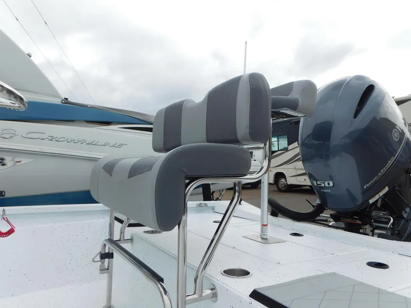 Slide: The Image of 2025 Xpress H21 Bay boat with dual seats and powerful outboard motor. - 6