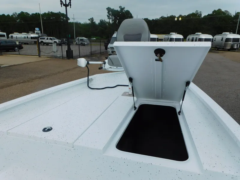 Slide: The Image of 2025 Xpress H21 Bay boat with open storage compartment on deck. - 8