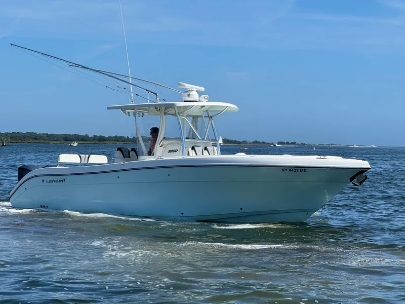 Slide: The Image of 2015 Century 3200 Center Console boat cruising on open water. - 22