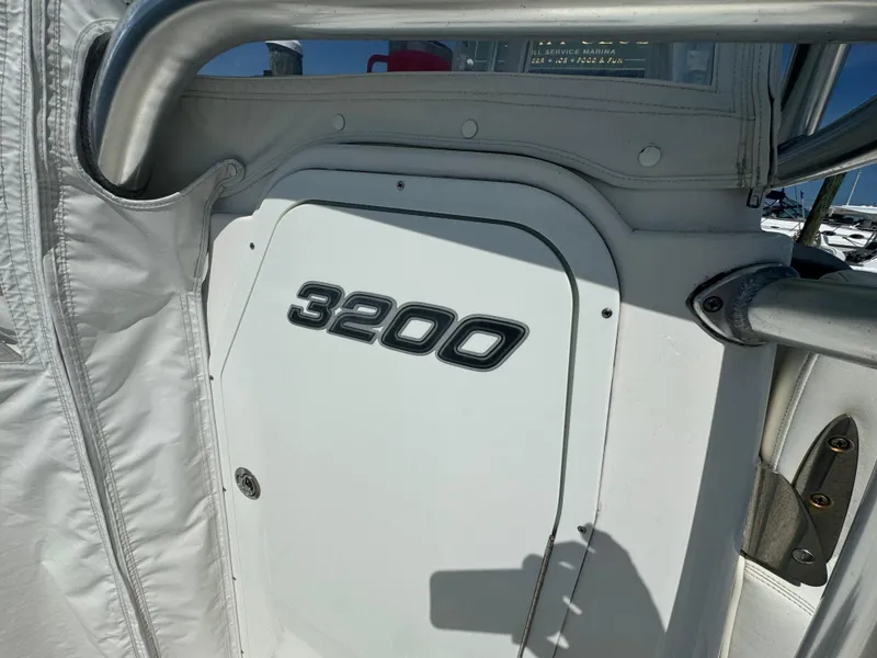 Slide: The Image of Century 3200 Center Console boat, 2015 model, featuring sleek design and sturdy construction. - 33