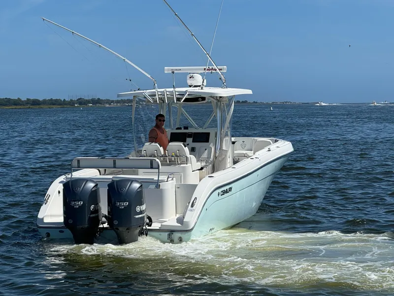 Slide: The Image of 2015 Century 3200 Center Console boat cruising on open water. - 36