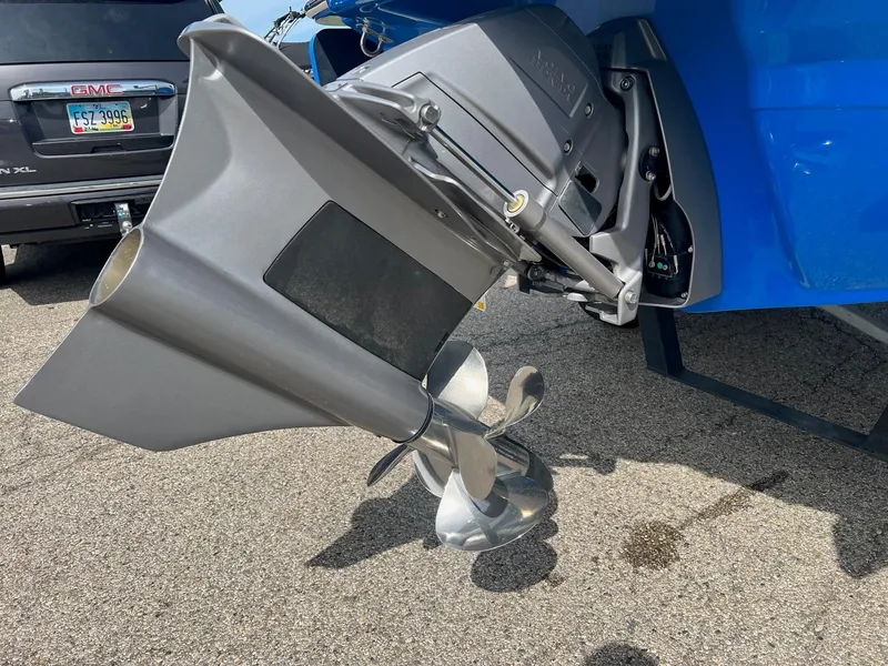 Slide: The Image of 2021 Chaparral 21 Surf boat propeller and outdrive on a sunny day. - 7