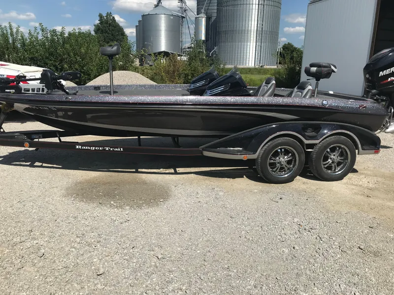 The Image of 2017 Ranger Z520 Comanche boat on trailer, parked outdoors near silos. - 1