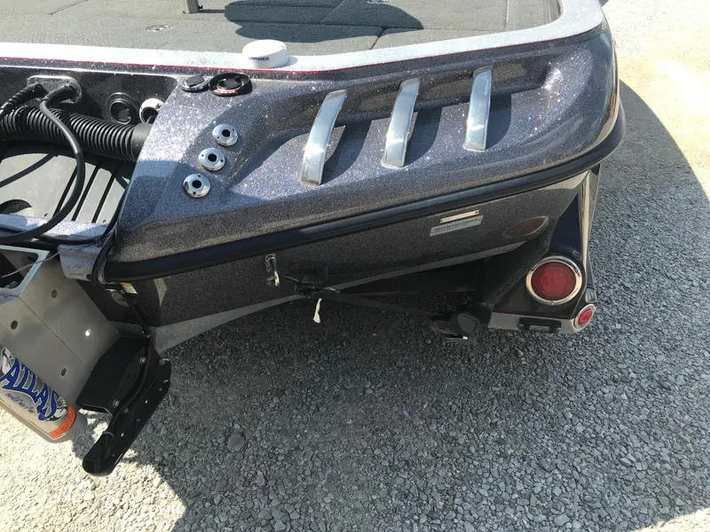 Slide: The Image of 2017 Ranger Z520 Comanche boat rear view, showing metallic finish and trailer attachment. - 16