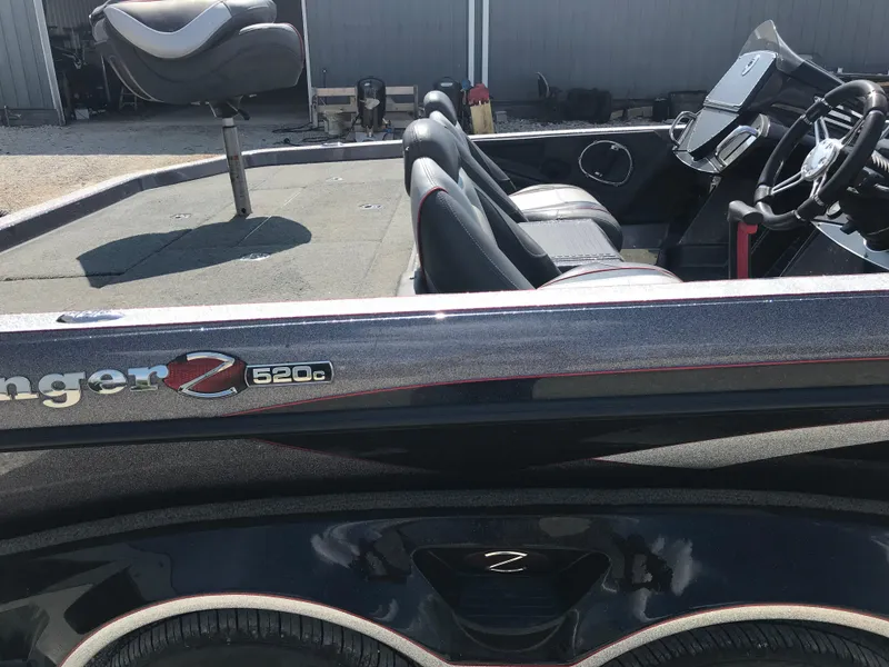 Slide: The Image of 2017 Ranger Z520 Comanche boat interior with seats and steering wheel. - 18