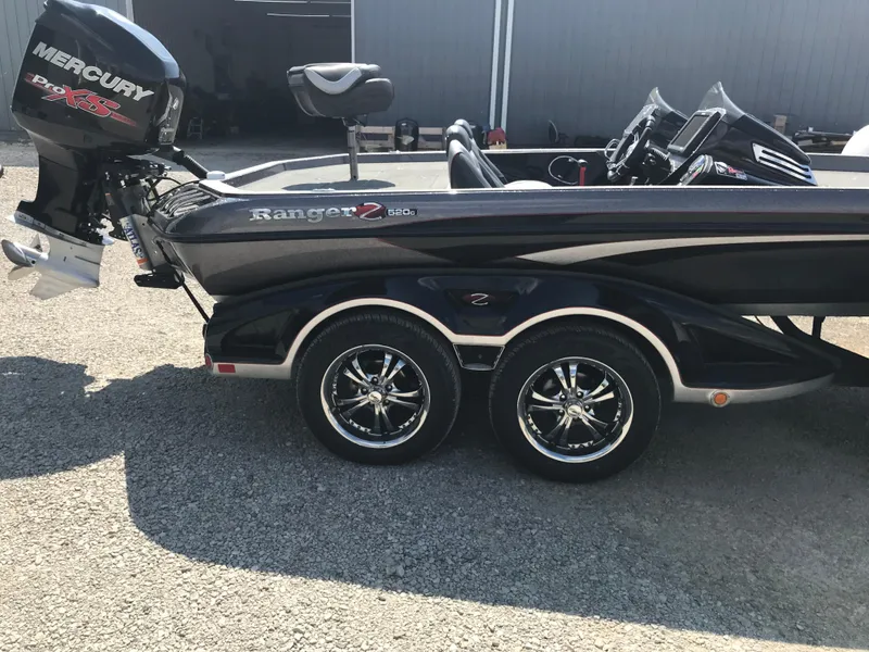 Slide: The Image of 2017 Ranger Z520 Comanche boat with Mercury Pro XS engine, parked on a trailer. - 20