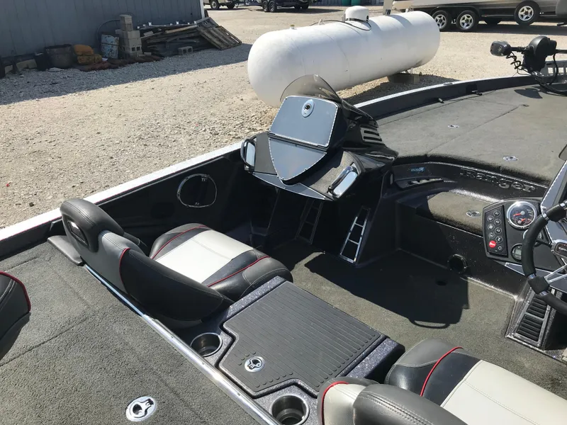 Slide: The Image of 2017 Ranger Z520 Comanche boat interior with seating and control panel. - 27