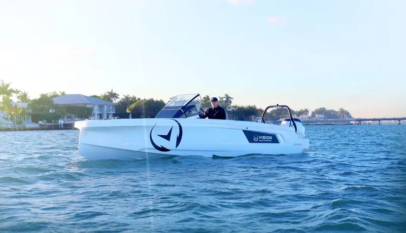 Slide: The Image of 2021 Axopar Spyder 22 boat cruising on a sunny day. - 0