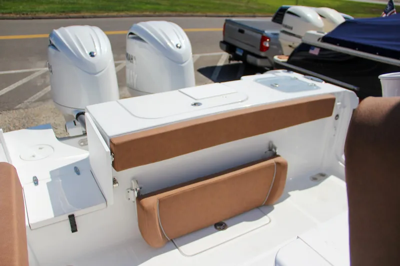 Slide: The Image of 2025 Sea Hunt Gamefish 25 boat interior with dual engines and seating. - 14