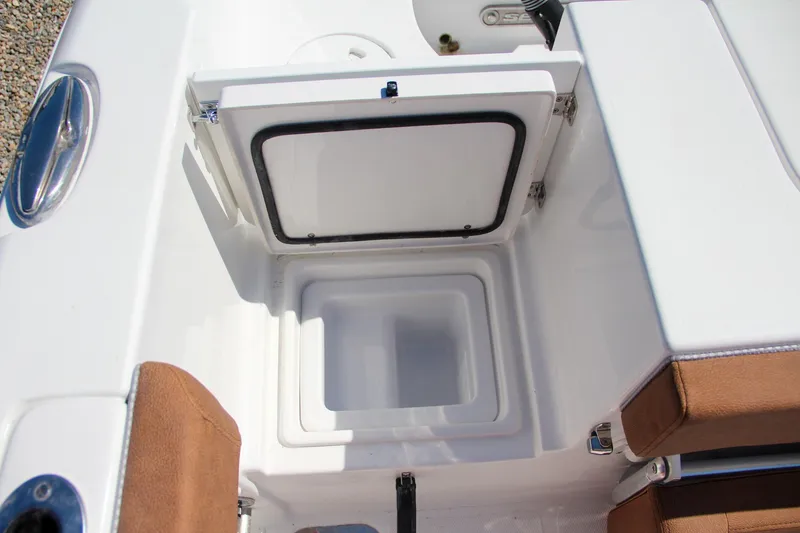 Slide: The Image of Open storage compartment on 2025 Sea Hunt Gamefish 25 boat. - 16