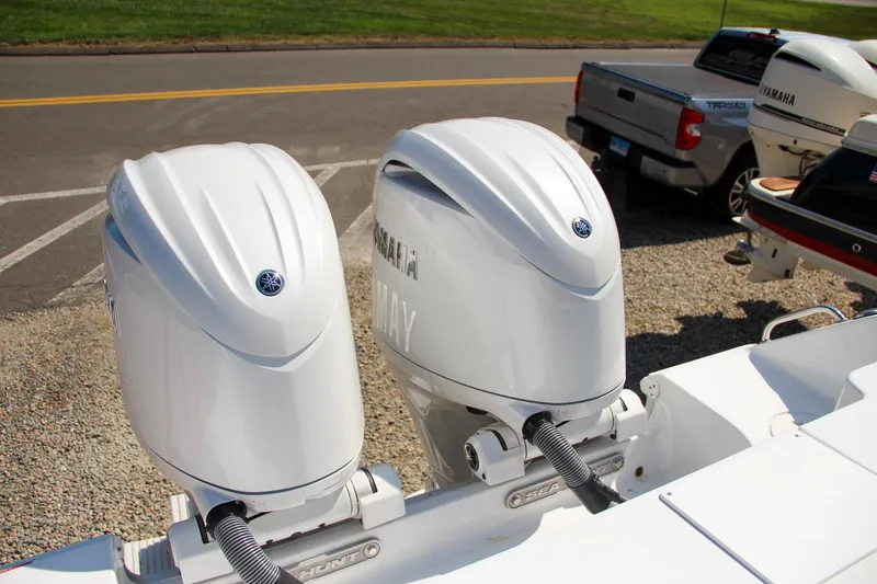 Slide: The Image of Twin Yamaha outboard engines on a 2025 Sea Hunt Gamefish 25 boat. - 51