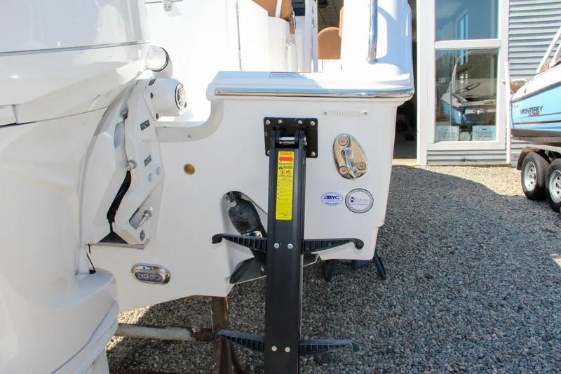 Slide: The Image of 2025 Sea Hunt Gamefish 25 boat stern with motor mount and accessories. - 9