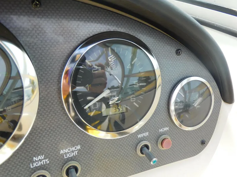 Slide: The Image of Close-up of 2006 Sea Ray 205 Sport dashboard with gauges and controls. - 15