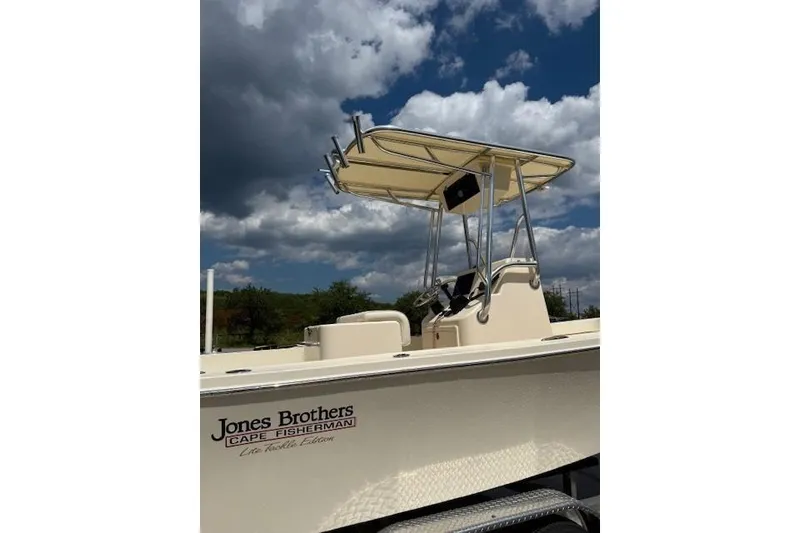Slide: The Image of 2026 Jones Brothers 20 Cape Fisherman boat on trailer, featuring Yamaha outboard motor. - 5