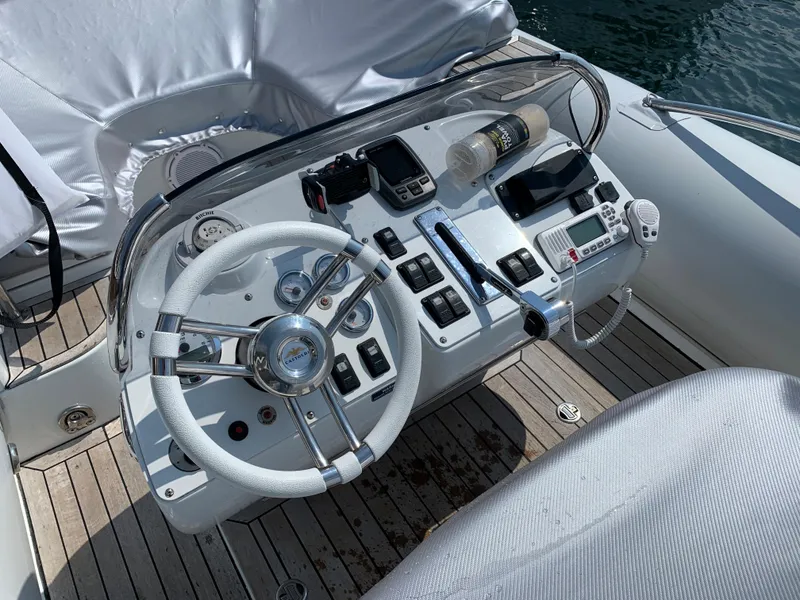 Slide: The Image of Cockpit of 2015 Castoldi 21 Diesel Jet Tender with steering wheel and controls. - 4