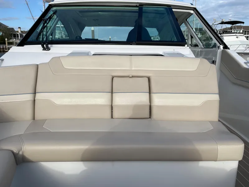 Slide: The Image of 2019 Formula 400 SSC boat with beige leather seating and glass windows. - 15