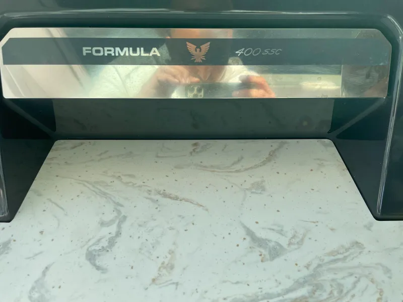 Slide: The Image of 2019 Formula 400 SSC nameplate on a marbled surface. - 8