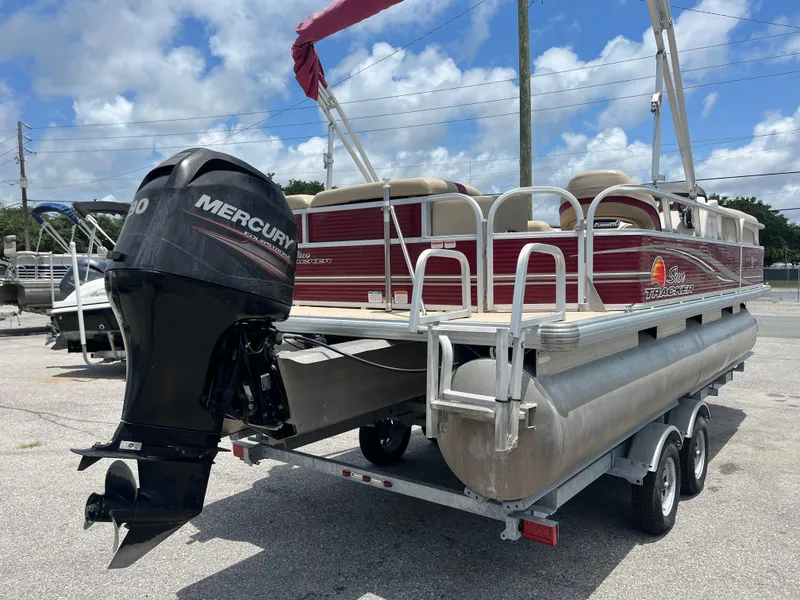 Slide: The Image of 2013 Sun Tracker Party Barge 22 DLX pontoon boat with Mercury outboard motor. - 4