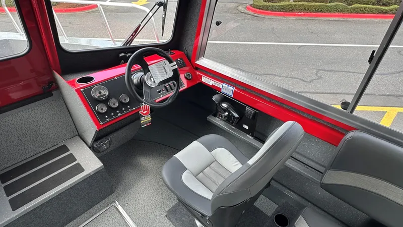 Slide: The Image of Interior of 2024 Spartan 220 Maximus Pro with dual seats and dashboard view. - 4