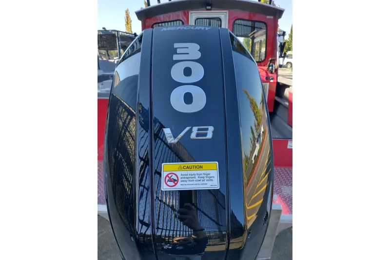 Slide: The Image of Outboard motor with "300 V8" label on a 2024 Spartan 220 Maximus Pro boat. - 12
