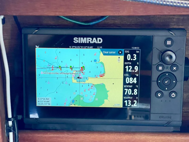 Slide: The Image of Simrad navigation display on 1980 Catalina 38, showing nautical chart and vessel data. - 28
